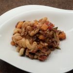 Completed macaroni vegetable casserole on a white plate