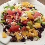 Greek salad on a white plate