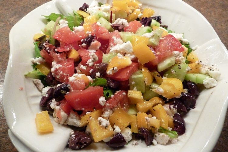 Greek salad on a white plate