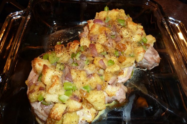 Baked pork chop with bread and celery stuffing