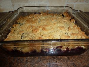 baked blueberry crisp in baking dish