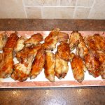 oven-roasted chicken wings on a serving plate
