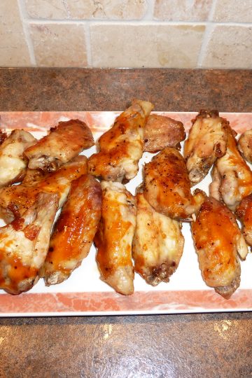 oven-roasted chicken wings on a serving plate