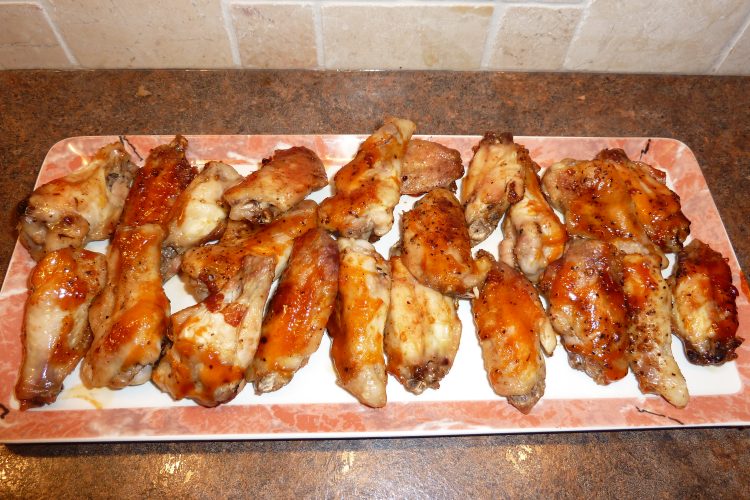 oven-roasted chicken wings on a serving plate
