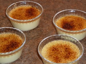 Four creme brulées in ramekins