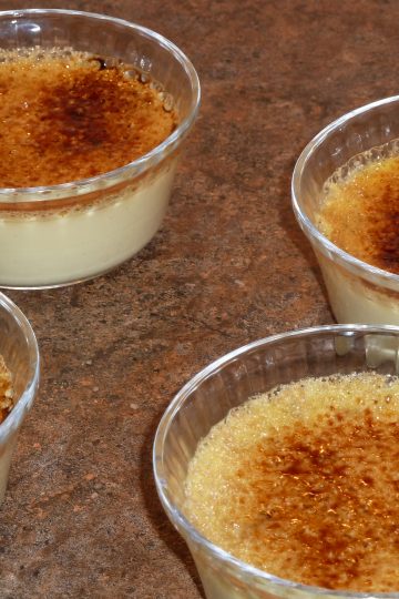 Four creme brulées in ramekins