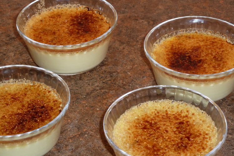 Four creme brulées in ramekins