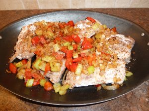 ribs with vegetables going in to roast