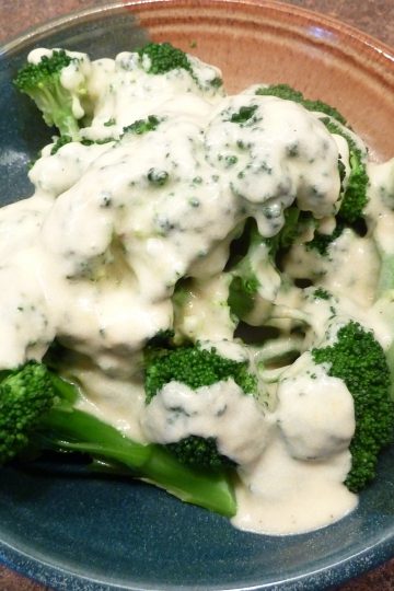 cheese sauce on broccoli