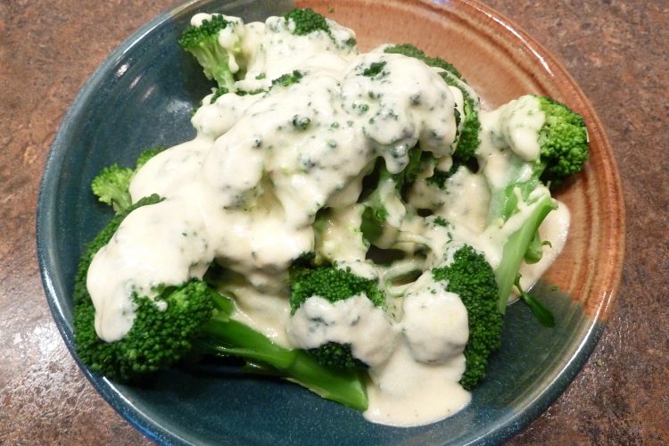 cheese sauce on broccoli