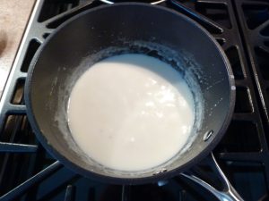 white sauce in a saucepan