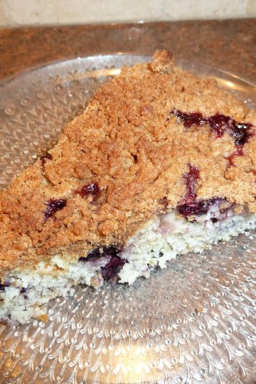 Blueberry Streusel Coffee Cake slice on a dessert plate