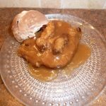 Cinnamon Spice Saucy Cake on a plate with ice cream