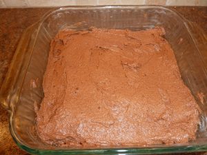 Spread the batter in the bottom of the baking dish