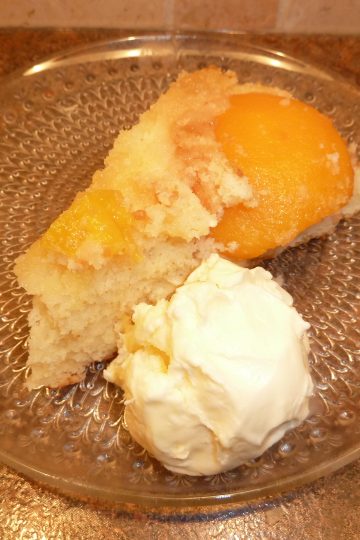 Slice of Peach-Upside Down Cake with ice cream