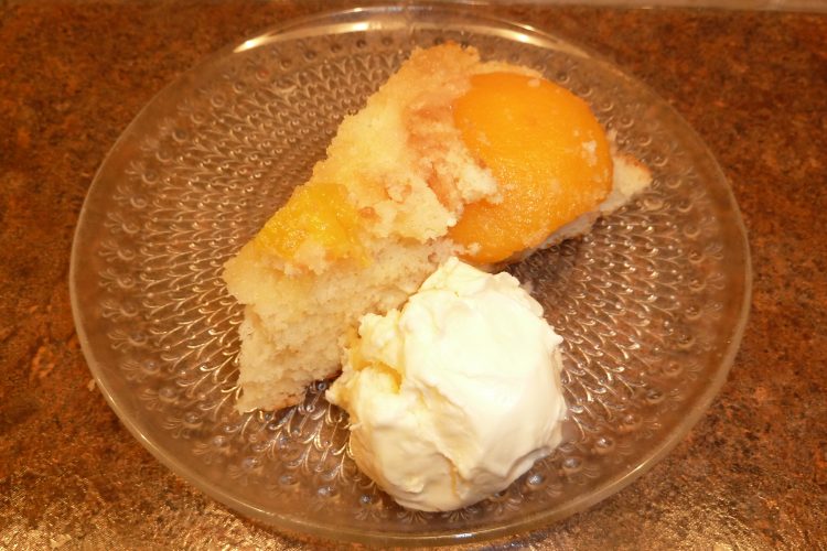 Slice of Peach-Upside Down Cake with ice cream