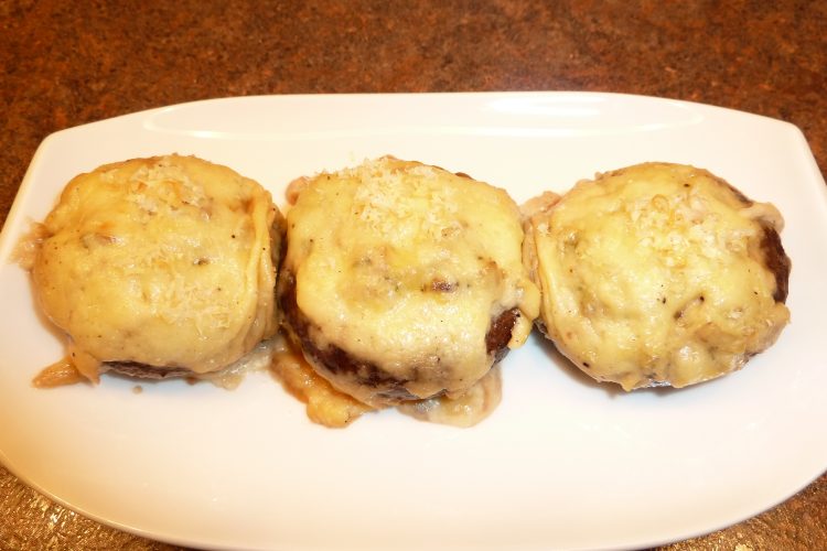 Mushrooms Gratinee presented on a white dish