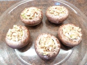 Mushrooms stuffed and ready to cook