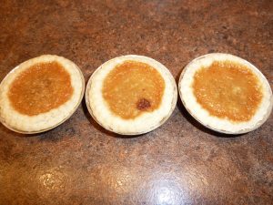 Baked buttertarts on countertop