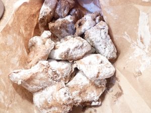 Dust Spareribs with flour before frying